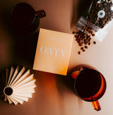 Whole espresso beans with a complex blend of berries, sweet lemon, Earl Grey, and honeysuckle, offering a comforting everyday flavor.