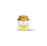 Premium OH CHA Jasmine loose leaf green tea with dried jasmine blossoms in decorative metal tea canister.