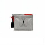 Gray packaging with a geometric design on a white background
