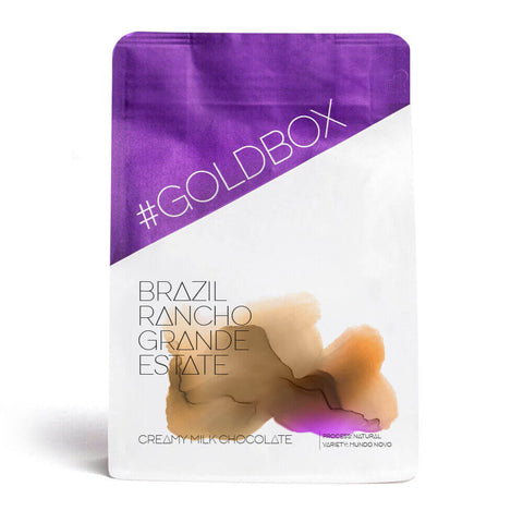 Packaging of Brazil Rancho Grande Estate coffee featuring creamy milk chocolate flavor.