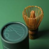 The Ceremonial Matcha Starter Bundle : Emerald featuring a bamboo whisk and Midori Spring Emerald Matcha tin.