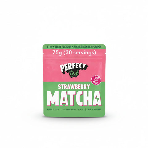 A pouch of PerfectTed Strawberry Matcha Powder with a whisk and a prepared matcha latte
