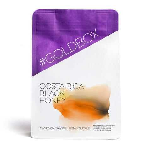 Costa Rica Black Honey coffee packaging featuring mandarin orange and honey suckle flavors.