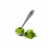 Era Matcha Scoop with green matcha powder, showcasing precision and elegant design in food-grade stainless steel.