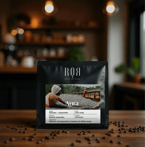 Ethiopia Aura Specialty Coffee bag in cozy café setting