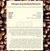 Close-up of Ethiopia Guji Hambela Heirloom coffee beans with processing details and tasting notes.