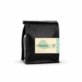 Ethiopia Guji Hambela Heirloom coffee bag showcasing its vibrant packaging.