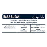 Product label for Baba Budan specialty coffee showing tasting notes of dark chocolate, caramel and spices, washed process, sourced from Chikkamagalur, India.