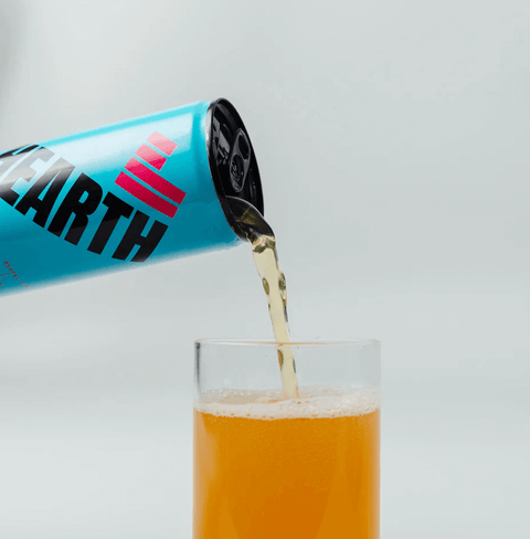 Drink Hearth Pink Grapefruit & Ginger beverage with bold, zesty citrus flavor and a spicy ginger kick—refreshing and all-natural delight.