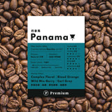 Premium Panama Geisha drip bag coffee label showcasing tasting notes and roast details on a background of coffee beans.