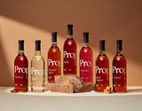 Lavender Syrup and other Proper Natural Syrups displayed on a beige background, showcasing vegan and gluten-free ingredients.