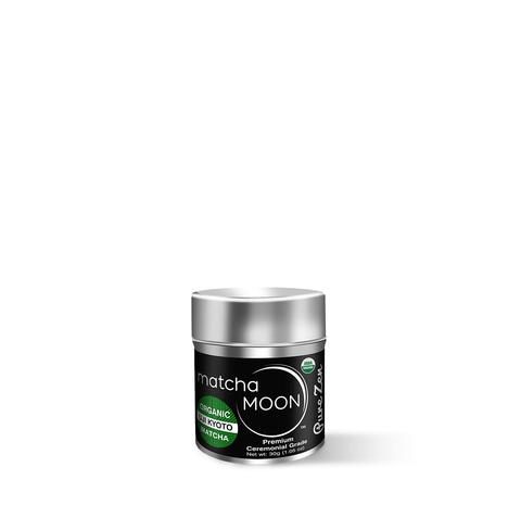 Pure Zen Premium Organic Japanese Matcha Green Tea Powder in a sleek black container, sourced from Kyoto.