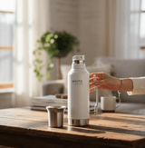 The Yerba Mate Kit featuring a White Prime Mate thermos and cup on a wooden table, perfect for yerba mate rituals.